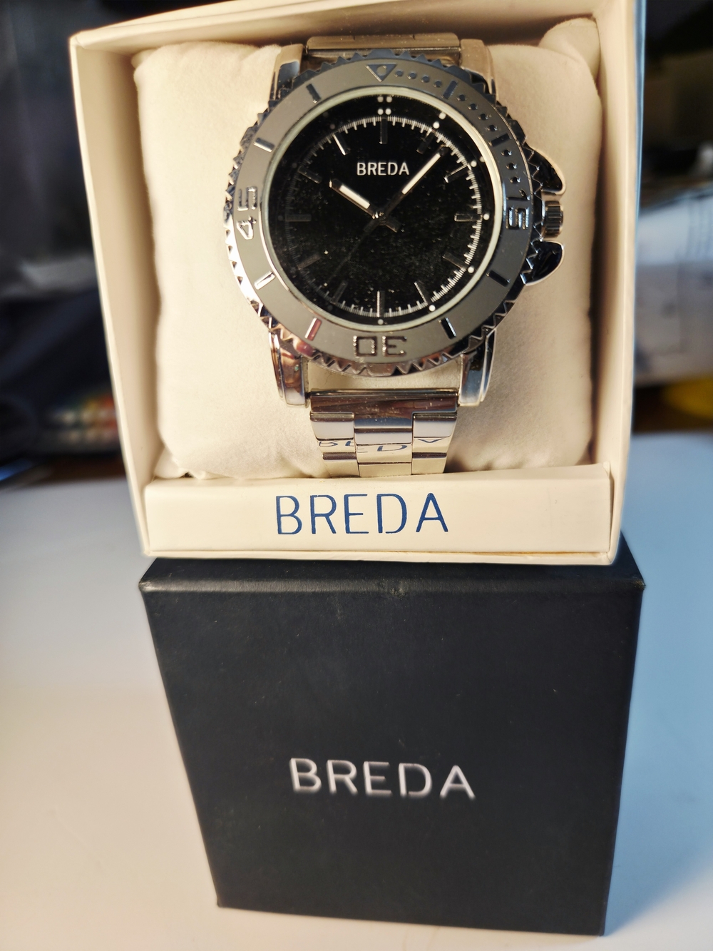 BRAND NEW IN THE BOX. BREDA Men's Silver Watch with Black Dial.